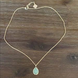 Kendra Scott gold pendant necklace in light blue